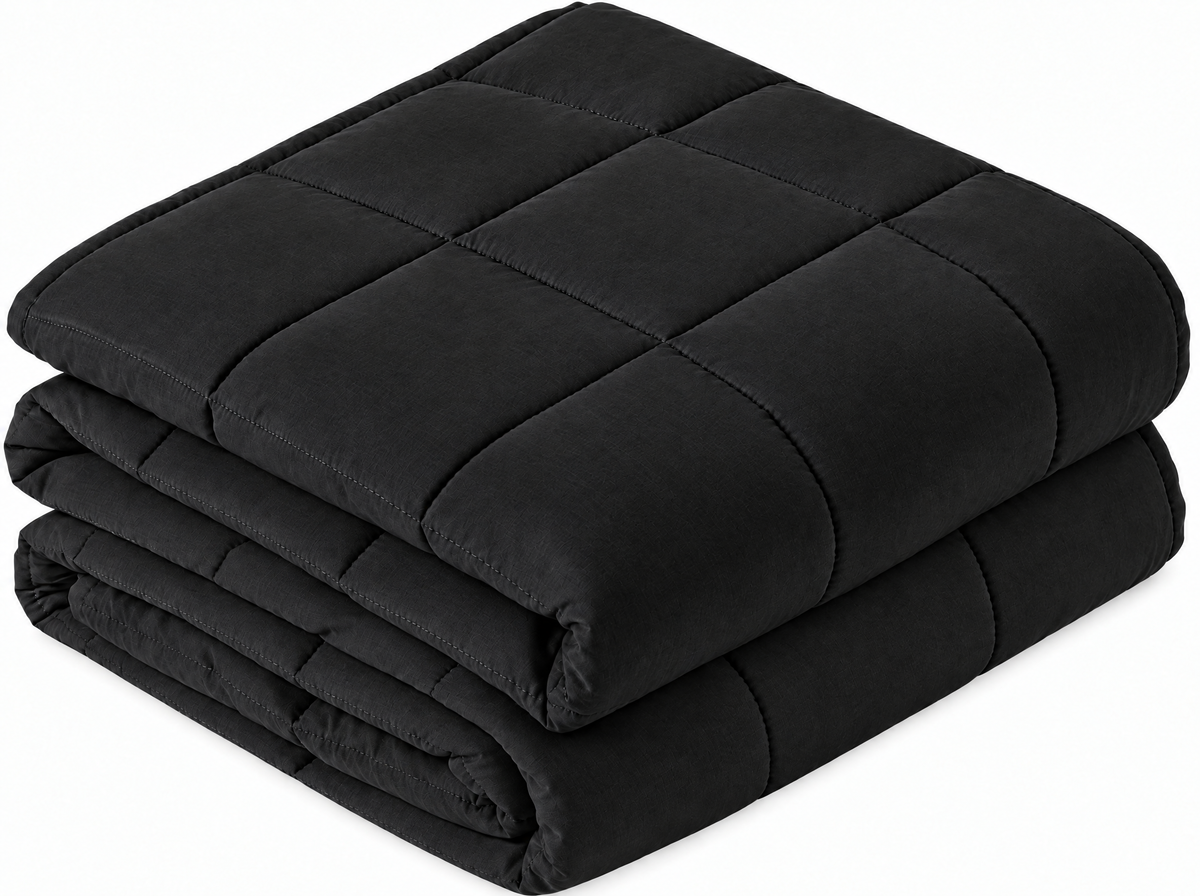 Couverture lestée noire pliée, surpiqûres carrées, sur fond blanc
